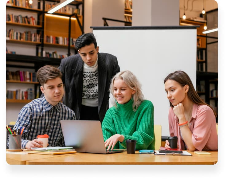 Web developers working together on code